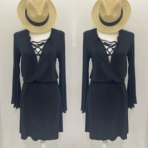 Black long sleeves cotton like black dress.